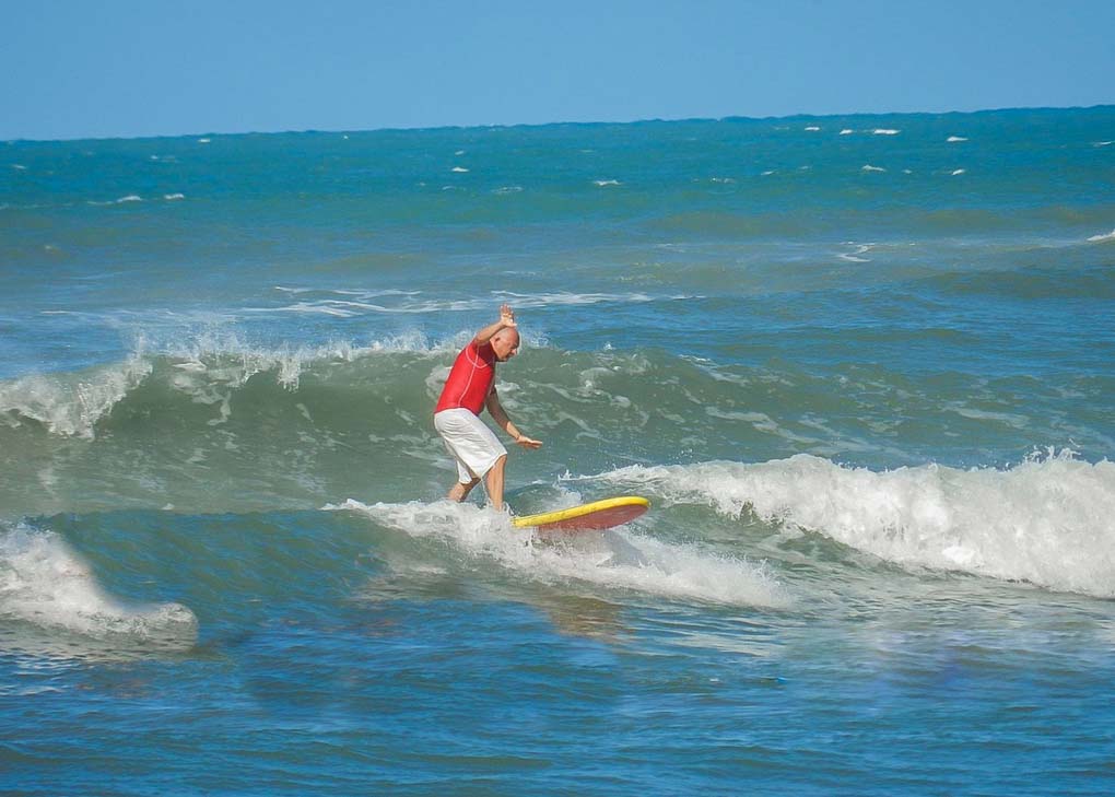 A man surfs in Pipa, Brazil