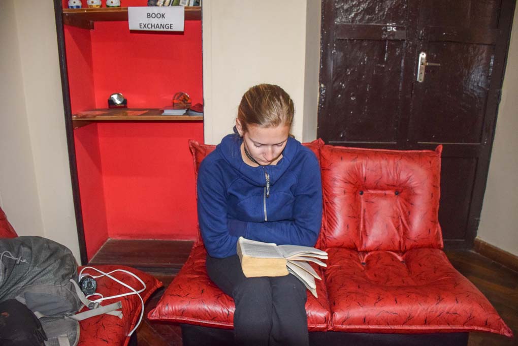 Bailey reading a Spanish book to practice learning in Sucre, Bolivia