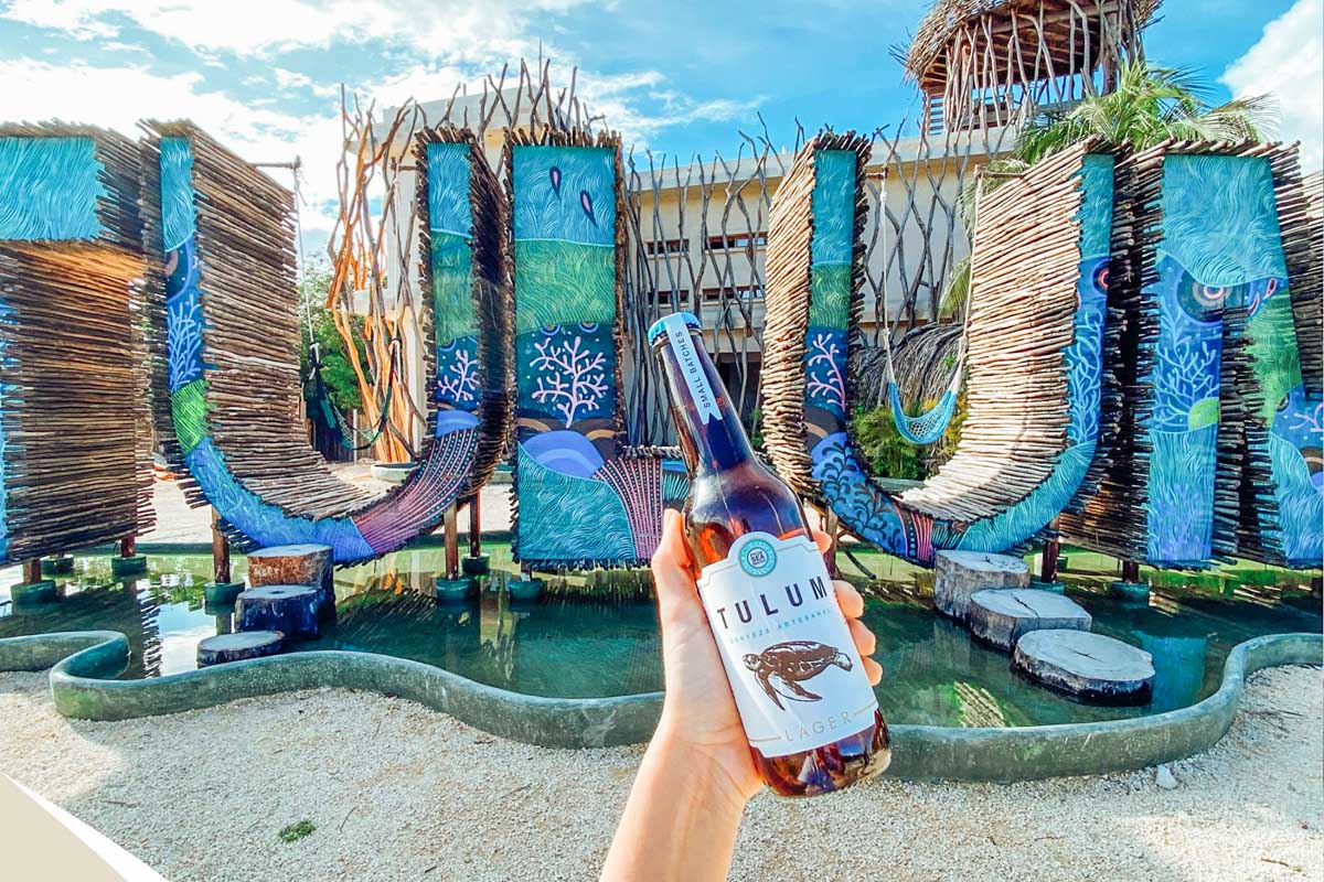Cerveza Tulum sign with a beer in Tulum, Mexico