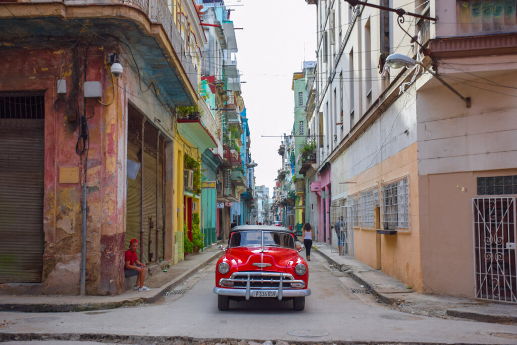 and old car in an old street in Cuba