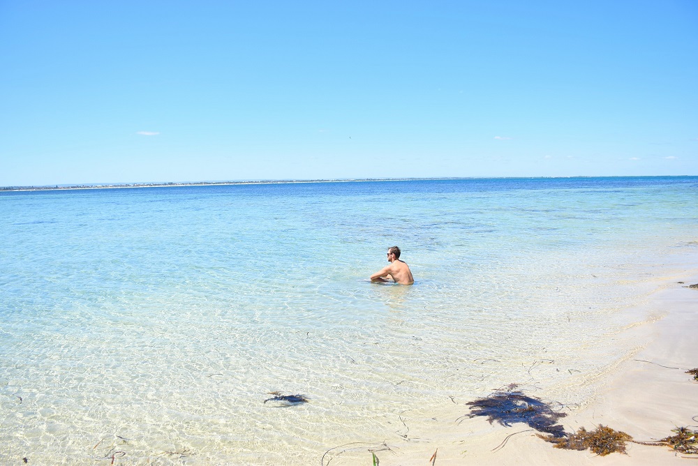 Relaxing on the beach on Penguin Island Perth