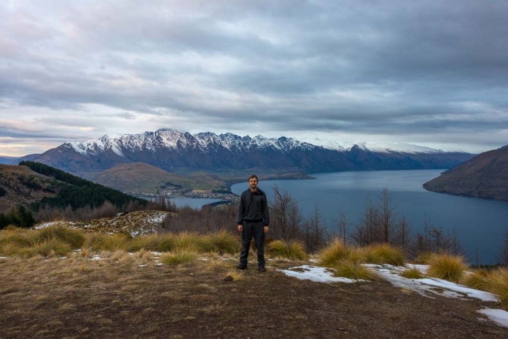 Standing at the top of the Fernhill Loop track looking over Queenstown and the Remarkables