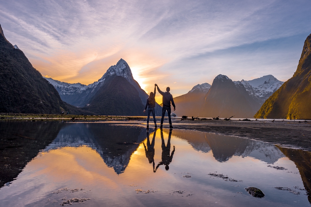 the sunset in milford sound