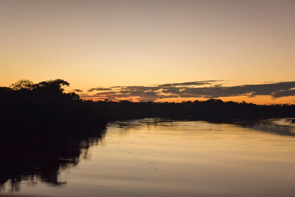 sunset over the river in Puerto Maldonado