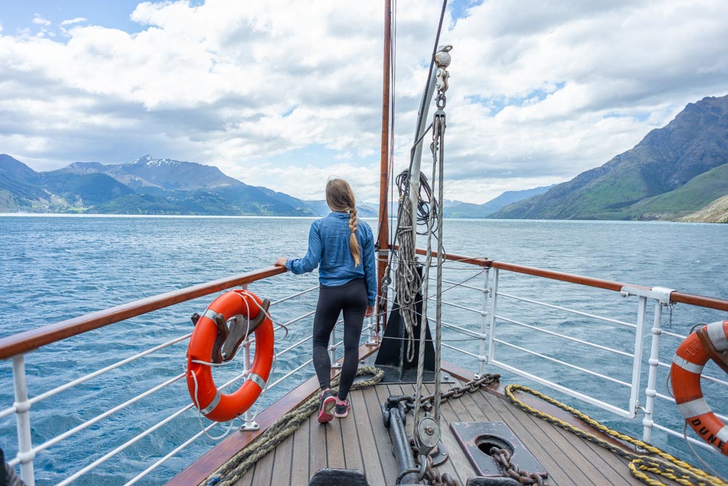 Bailey stands at the front of the TSS Earnslaw on our way back from Queenstown best bike tour