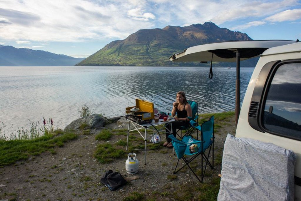 having lunch out of our van next to lake wakatipu in queenstown, new zealand