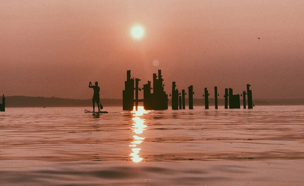paddleboarding in sri lanka at sunset