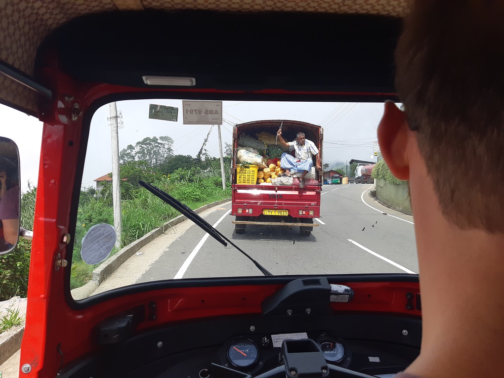 driving in a tuk-tuk in Sri Lanka