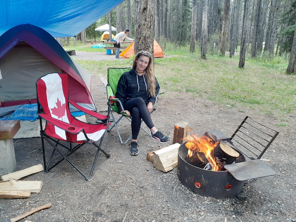 woman at a campsite at Two Jacks Lakeside in Banff National Park