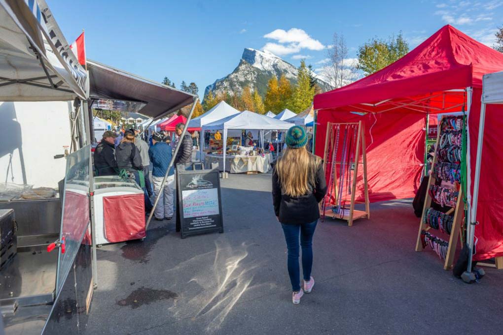 Bailey walks through the Banff Farmers Market
