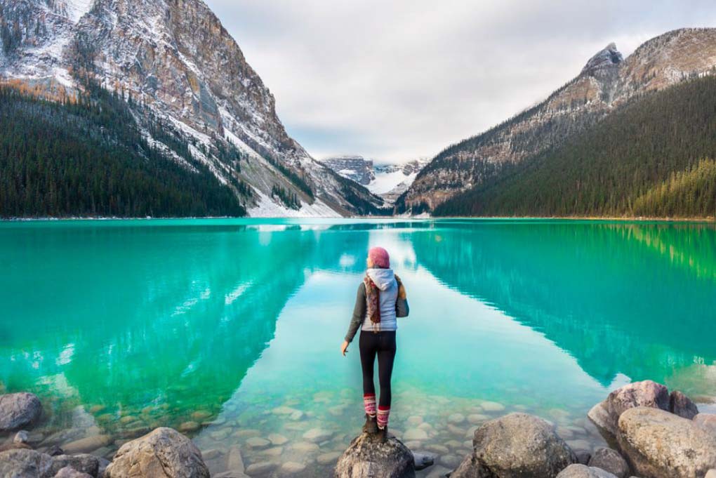 Bailey stands on a rock overlooking Lake Louise on our trip to Banff, Canada