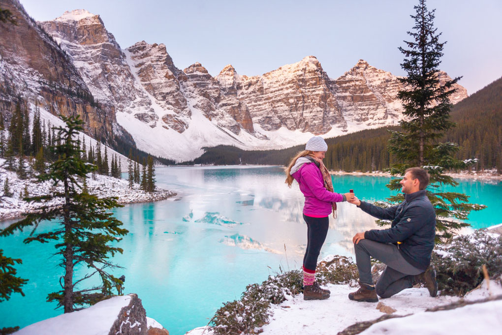 Me proposing on the rock pile at Lake Moraine in Banff National Park