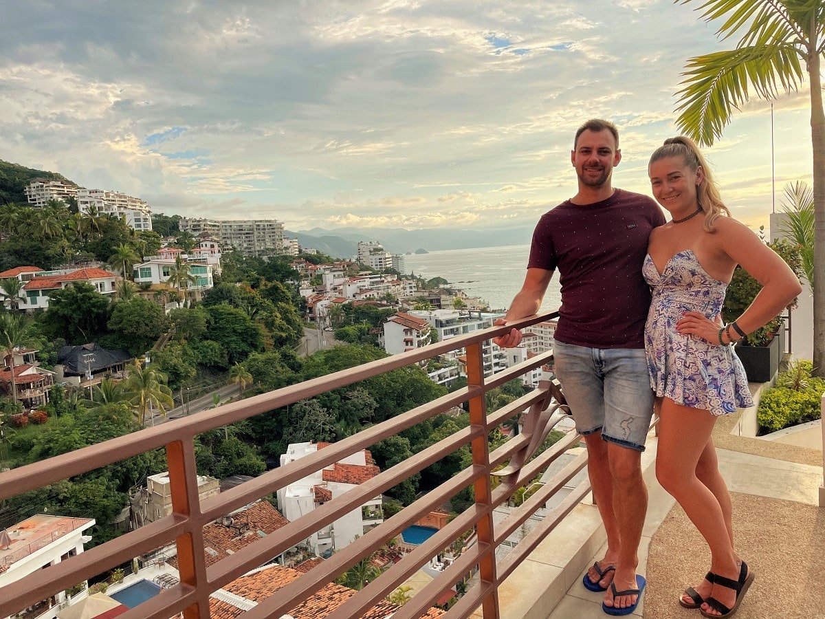 couple poses at sunset at the Sky Bar in Puerto Vallarta