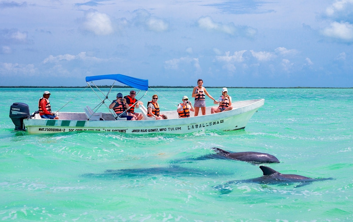 boat of tourists ready to swim with dolphins in Puerto Vallarta