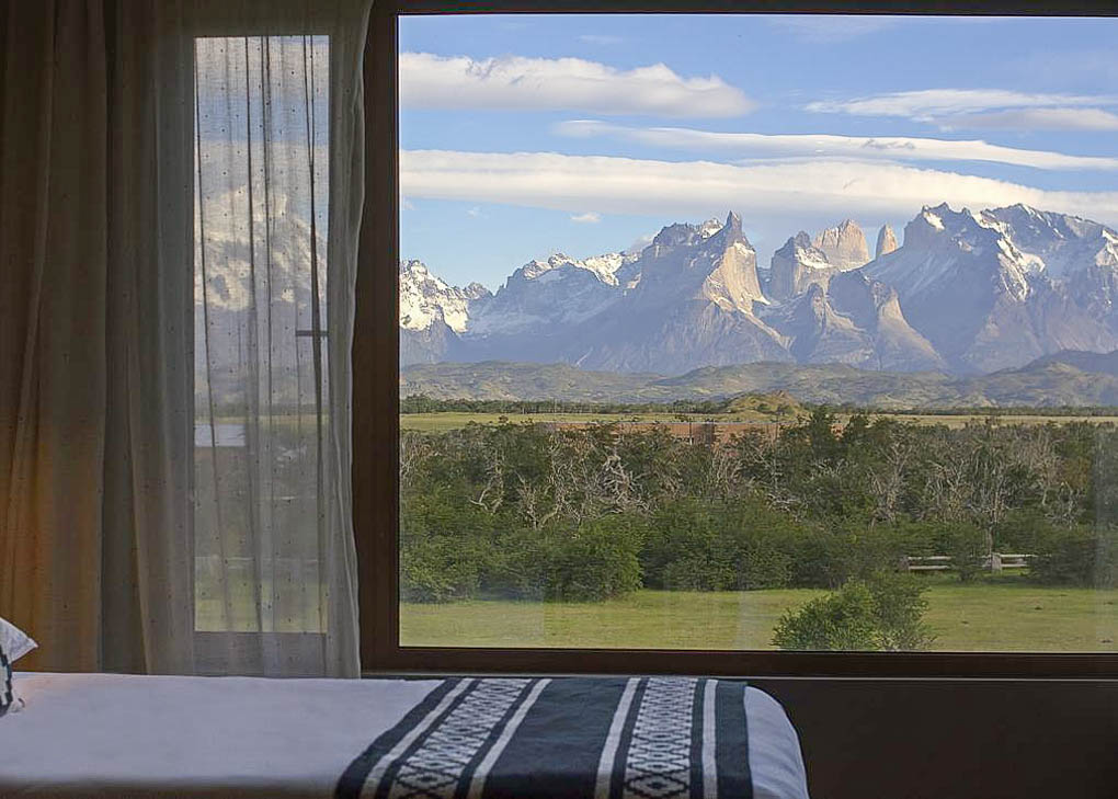 The view of Torres del Paine National Park from a room at Río Serrano Hotel + Spa