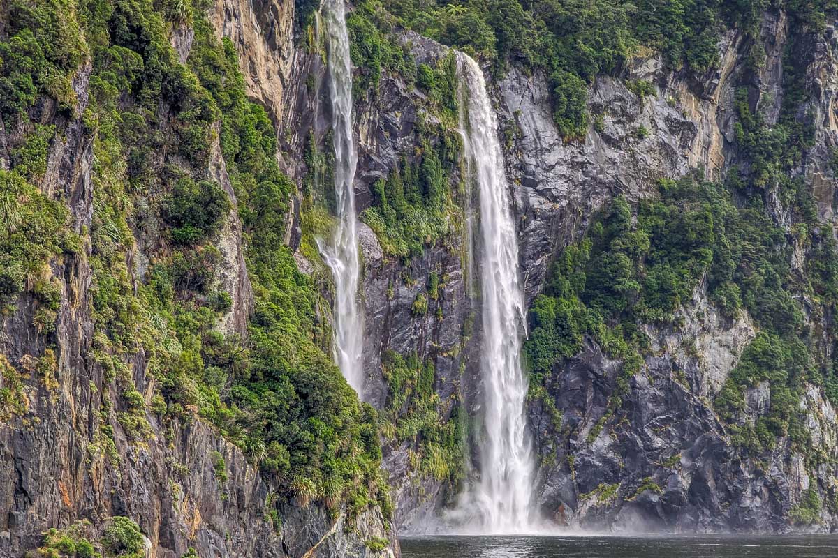 Powerful waterfall into Milford Sound, New Zealand