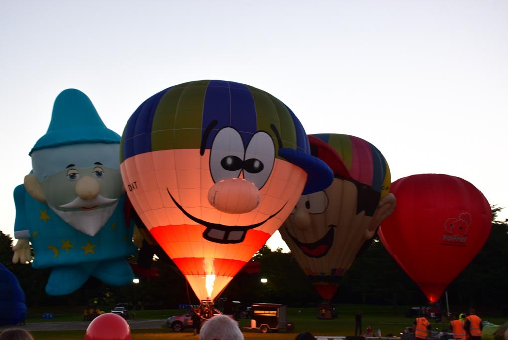 the hamilton hot air balloons getting inflated at the night show