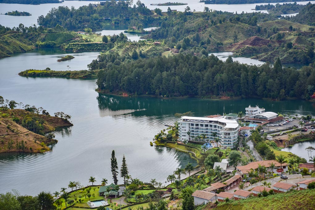 A hotel sits on the edge of the lake in Guatapé.