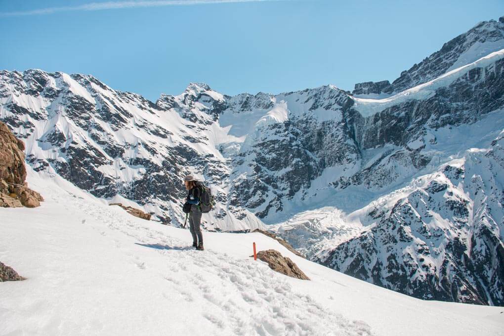 Surrounded by snow and mountains in the Mueller Hut Trail