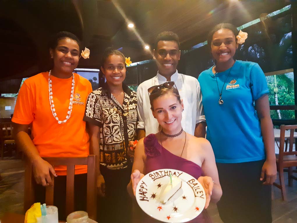 posing with some fijian workers at a hotel for my birthday