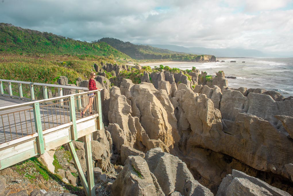 Bailey looks out over the Pancake Rocks in Punakaiki, New Zealand