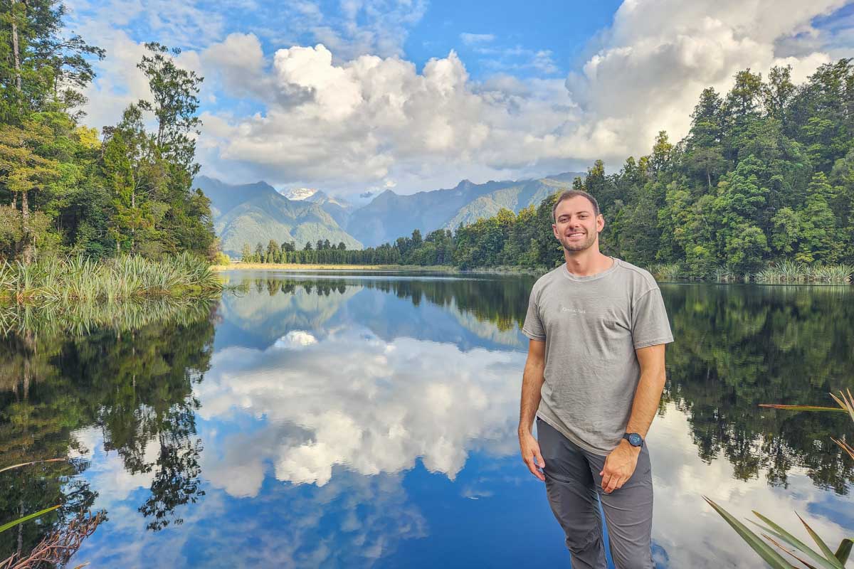 Daniel poses for a photo at Lake Matheson, NZ