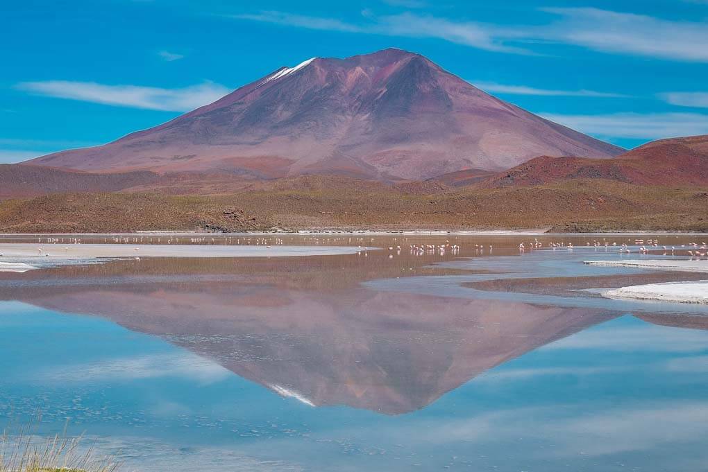 A reflection of a mountain on a lake on the salt flats tour from Uyuni