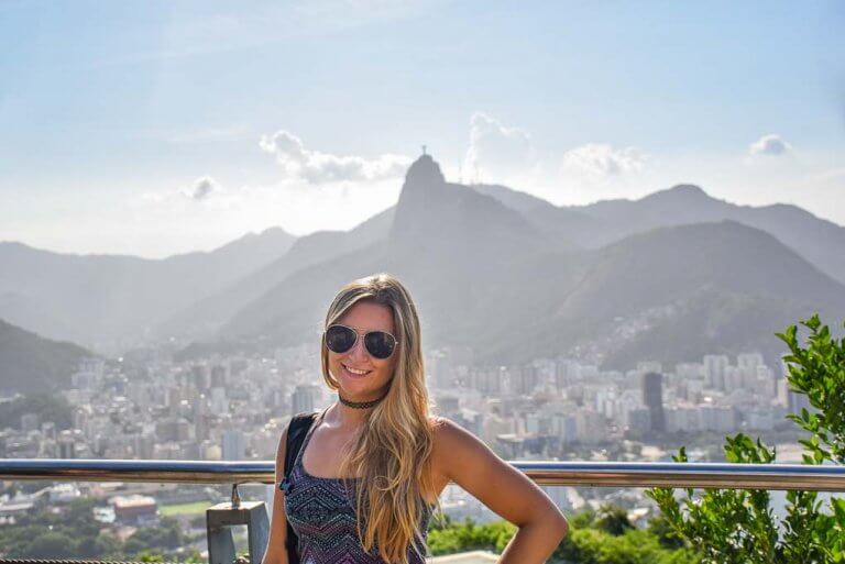 Bailey posses for a photo on a viewpoint overlooking the ciaty of Rio de Janeiro in BrazilBailey posses for a