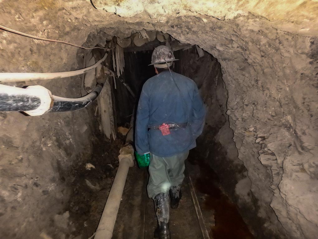 A man walks down a shaft in the mines around Potosi, Bolivia