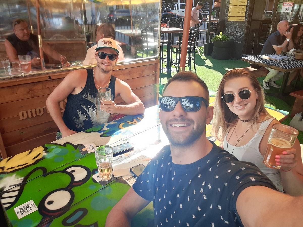 three friends drinking at the Cambie in Gastown, Vancouver