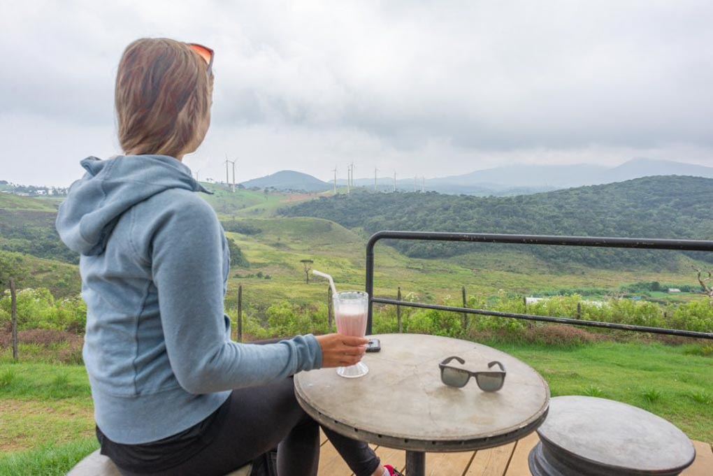 Enjoying a strawberry milkshake at the strawberry farms