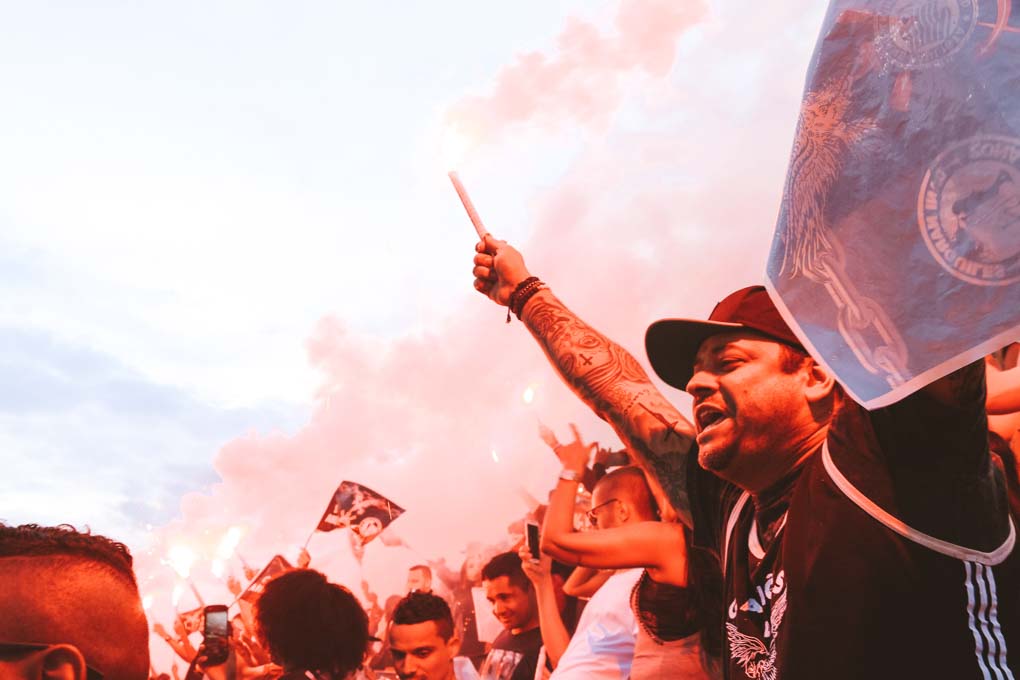 Fans cheer at a Sao Paulo soccer game