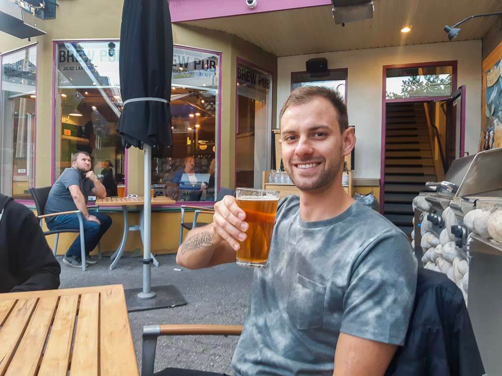 Enjoying a beer at the Grizzly Paw in Canmore