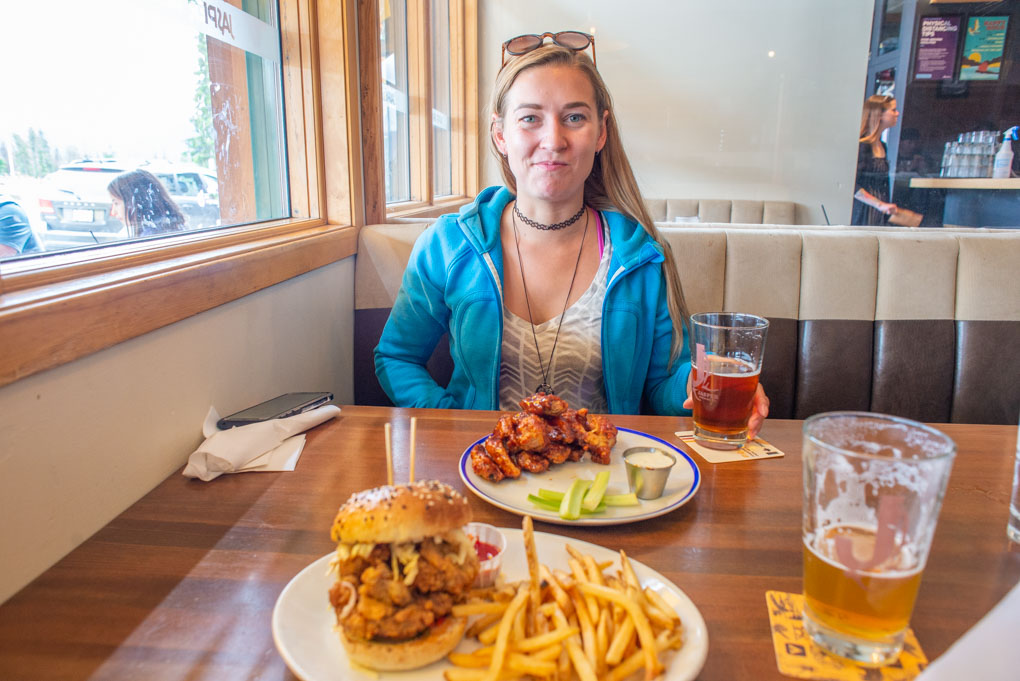 Bailey enjoying her wings at Jasper Brewing Co while I get ready to eat my chicken sandwich!