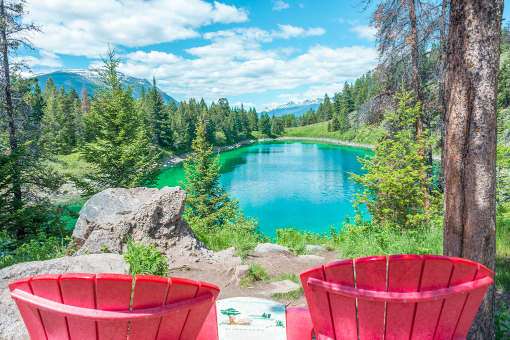 One of the lake on the valley of the Five Lakes hike in Jasper with the famous red chairs