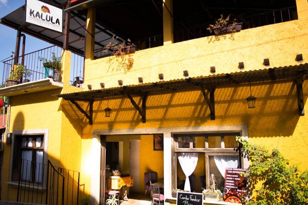 the outside of Kulula Cafe in Lanquin, Guatemala