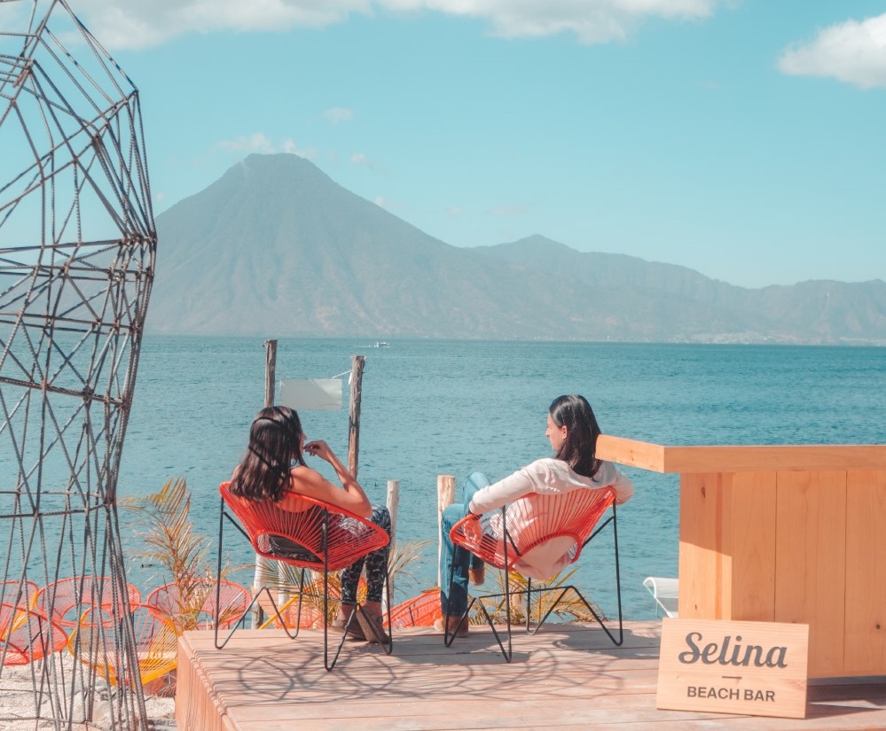 the view of lake atitilan from selina atitlan hostel beach bar