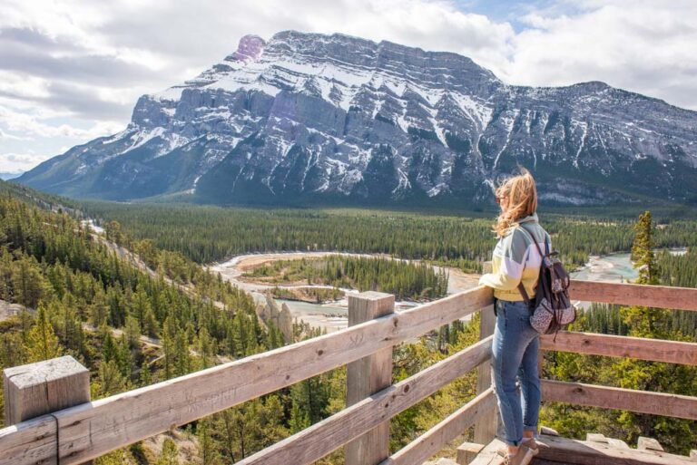 A lady poses for a photo at the Banff Hoodoos