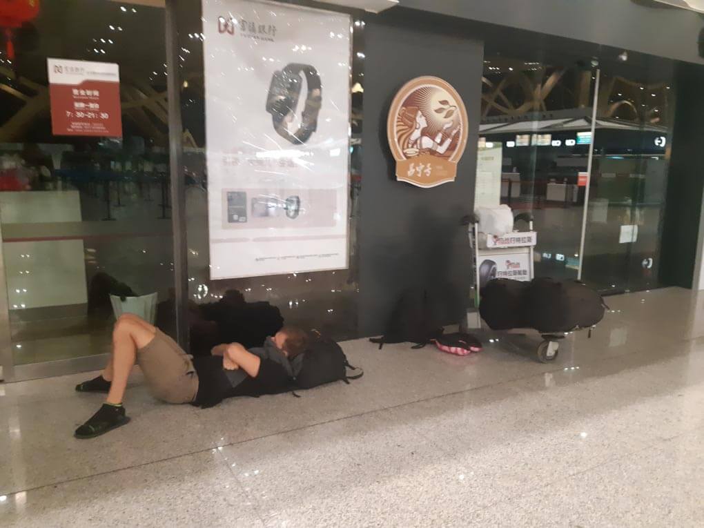 Sleaping on an airport floor during a long layover