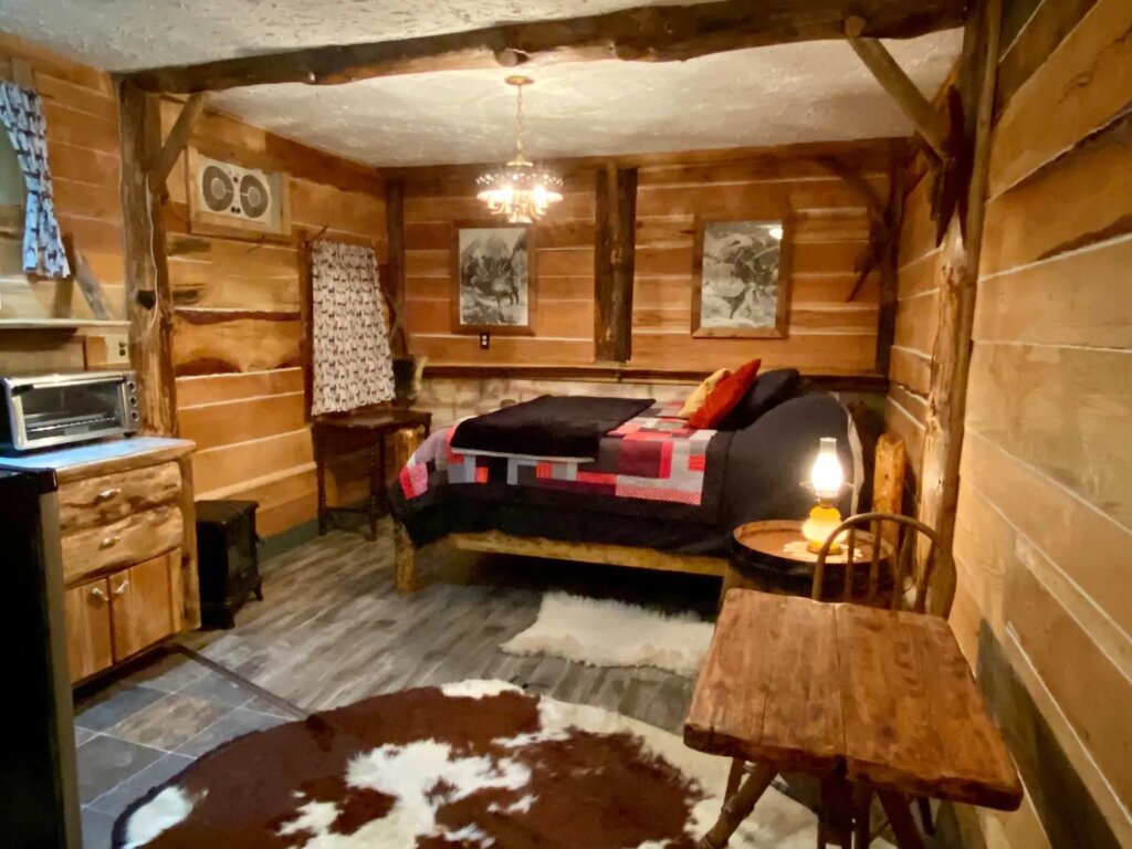 inside of the rustic trappers cabin Airbnb in Vernon, BC