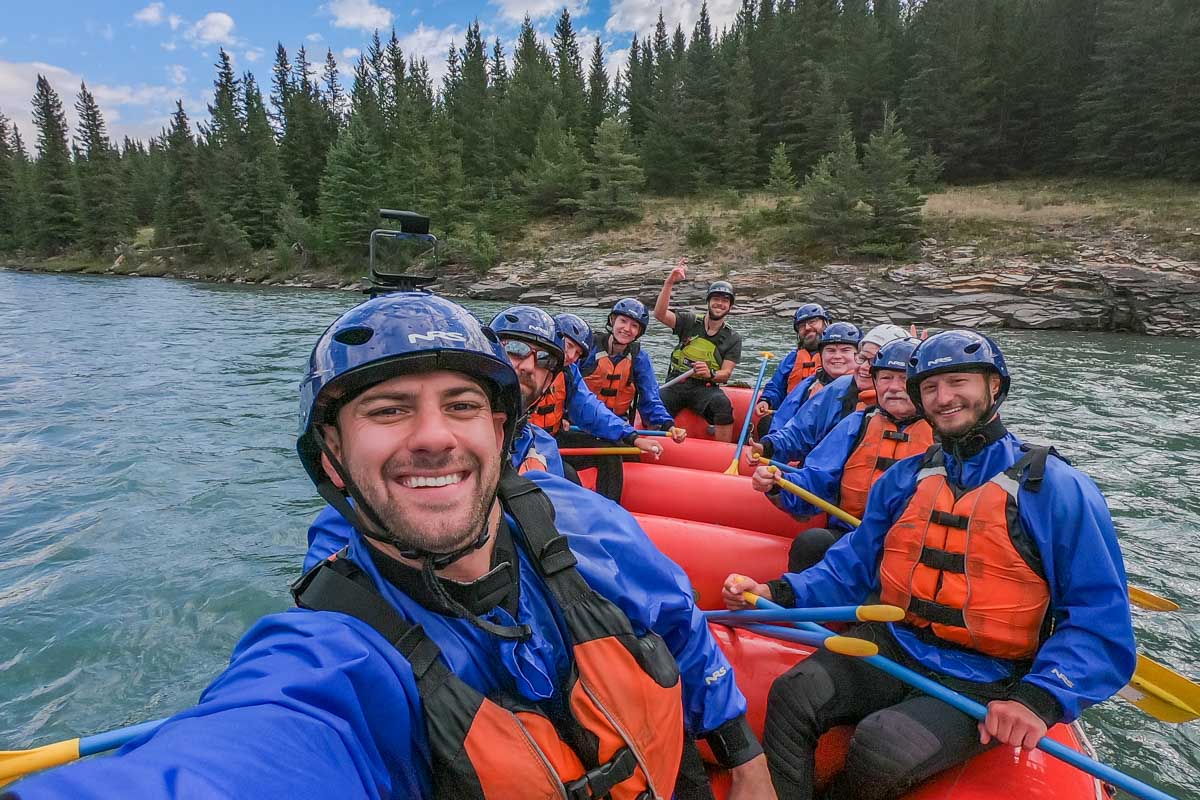 Daniel takes a selfie with the rafting crew in Revelstoke while white water rafting