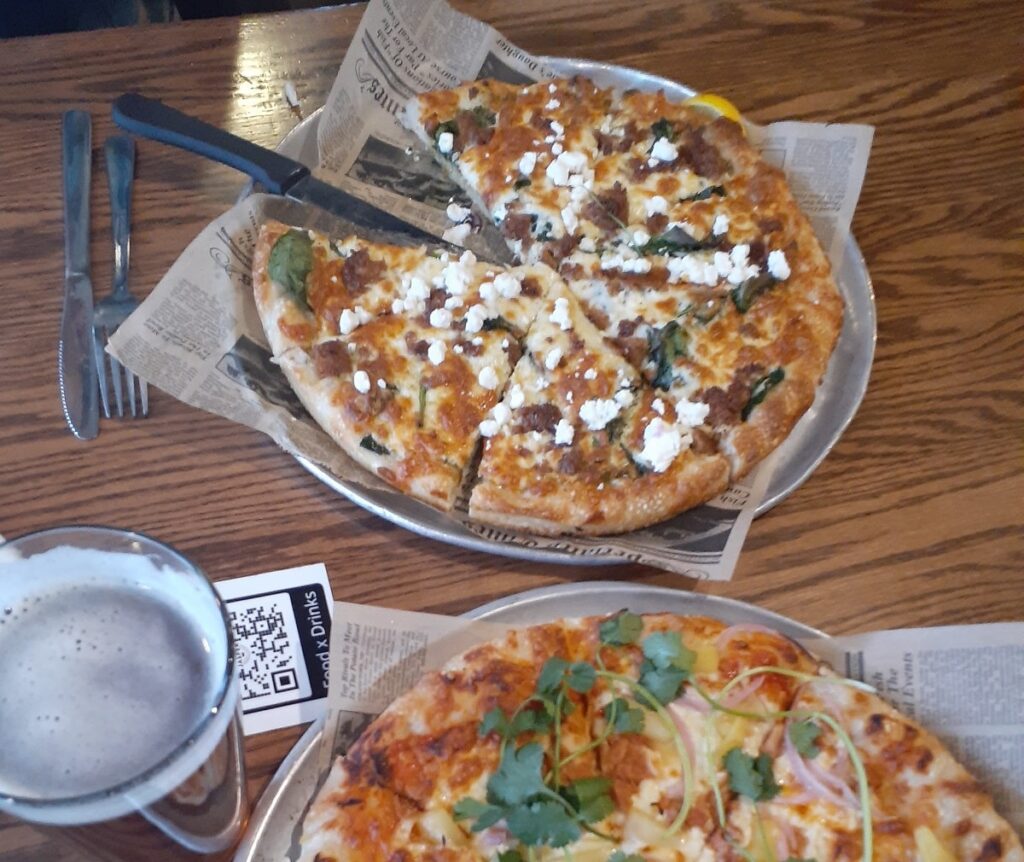 two pizzas from the Jasper Pizza Place