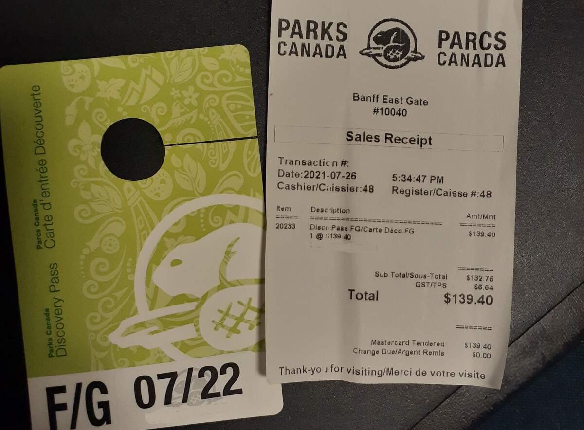 photo of a green Parks Canada Pass as well as receipt of purchase