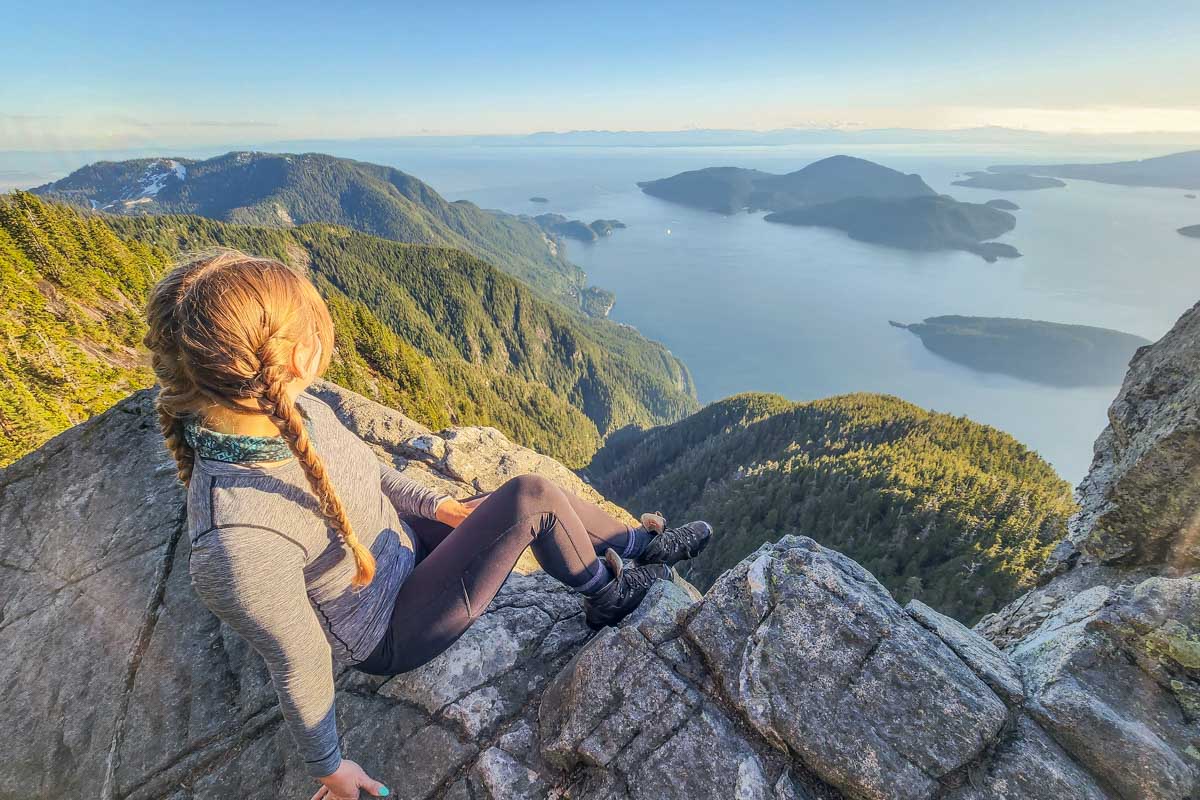Bailey at the top of St Marks Summit at sunset in Vancouver