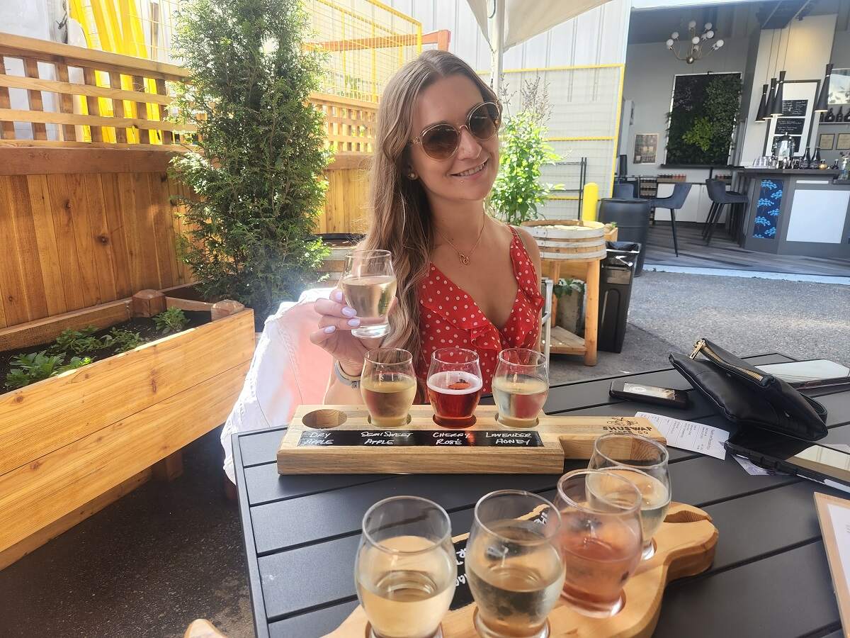 Bailey and a flight of cider at the Shuswap Cider Co.