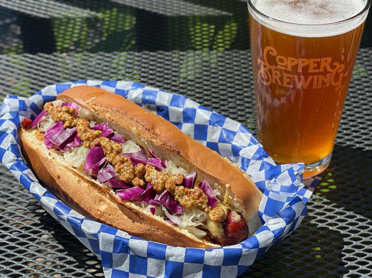 a hot dog and beer from Copper Brewing Co in Kelowna