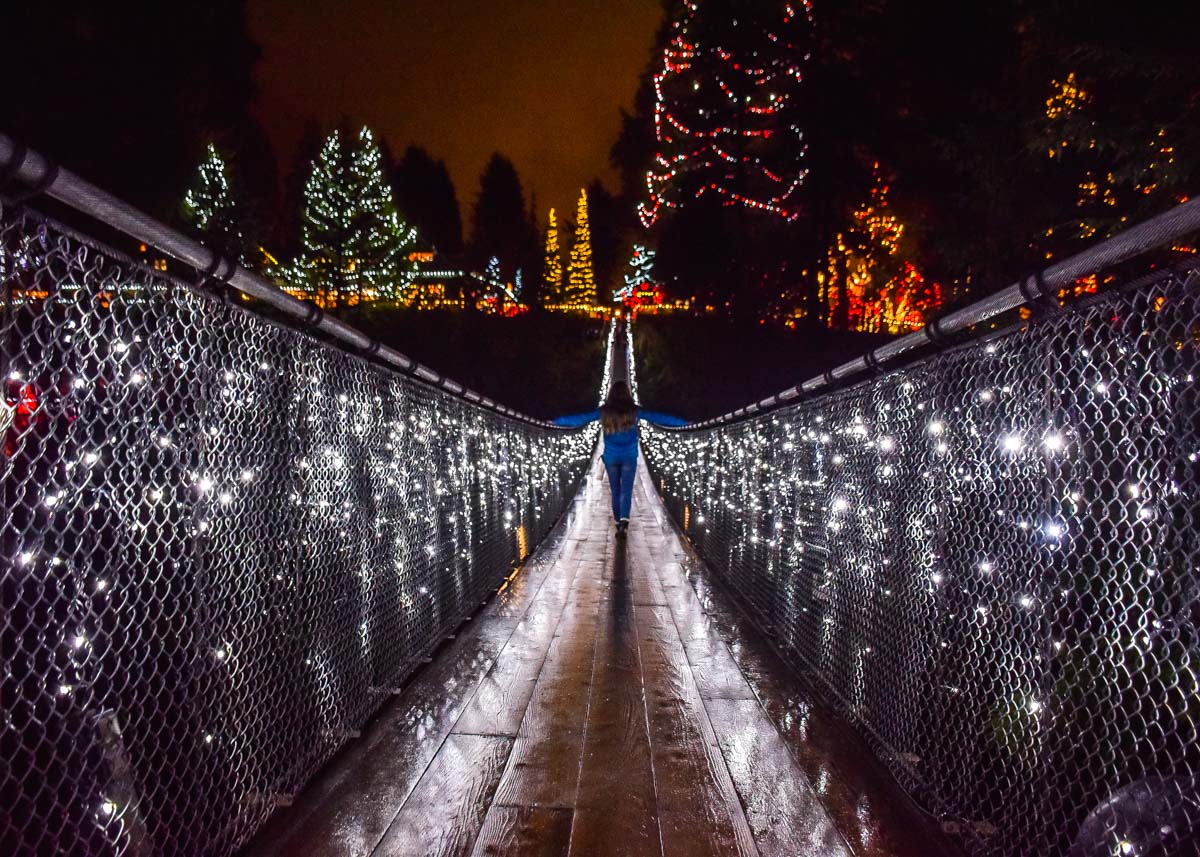 On the Capilano Suspension Bridge at night during winter in Vancouver
