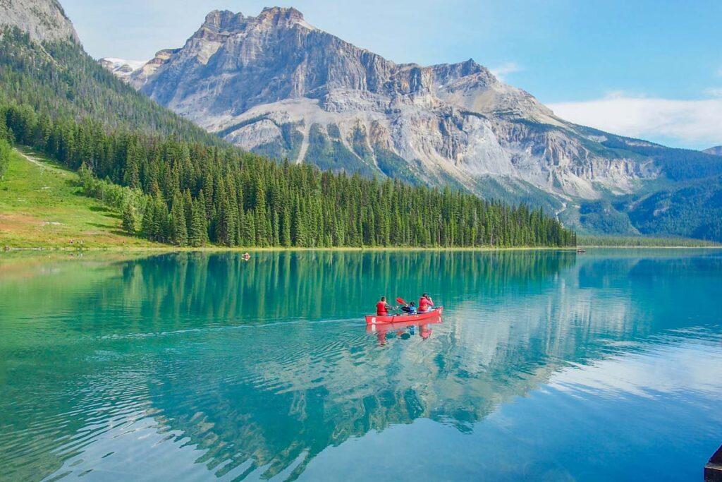 People canoe on Emerald Lake