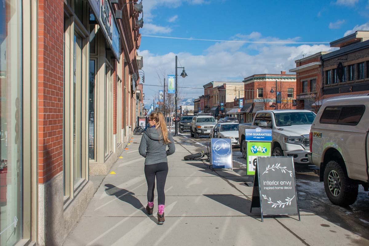 A lady walks 2nd Ave