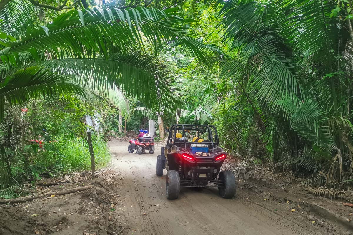 An ATV drives through the forest in Sayulita, Mexico